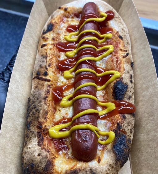 A Pizza Dog fresh from the oven